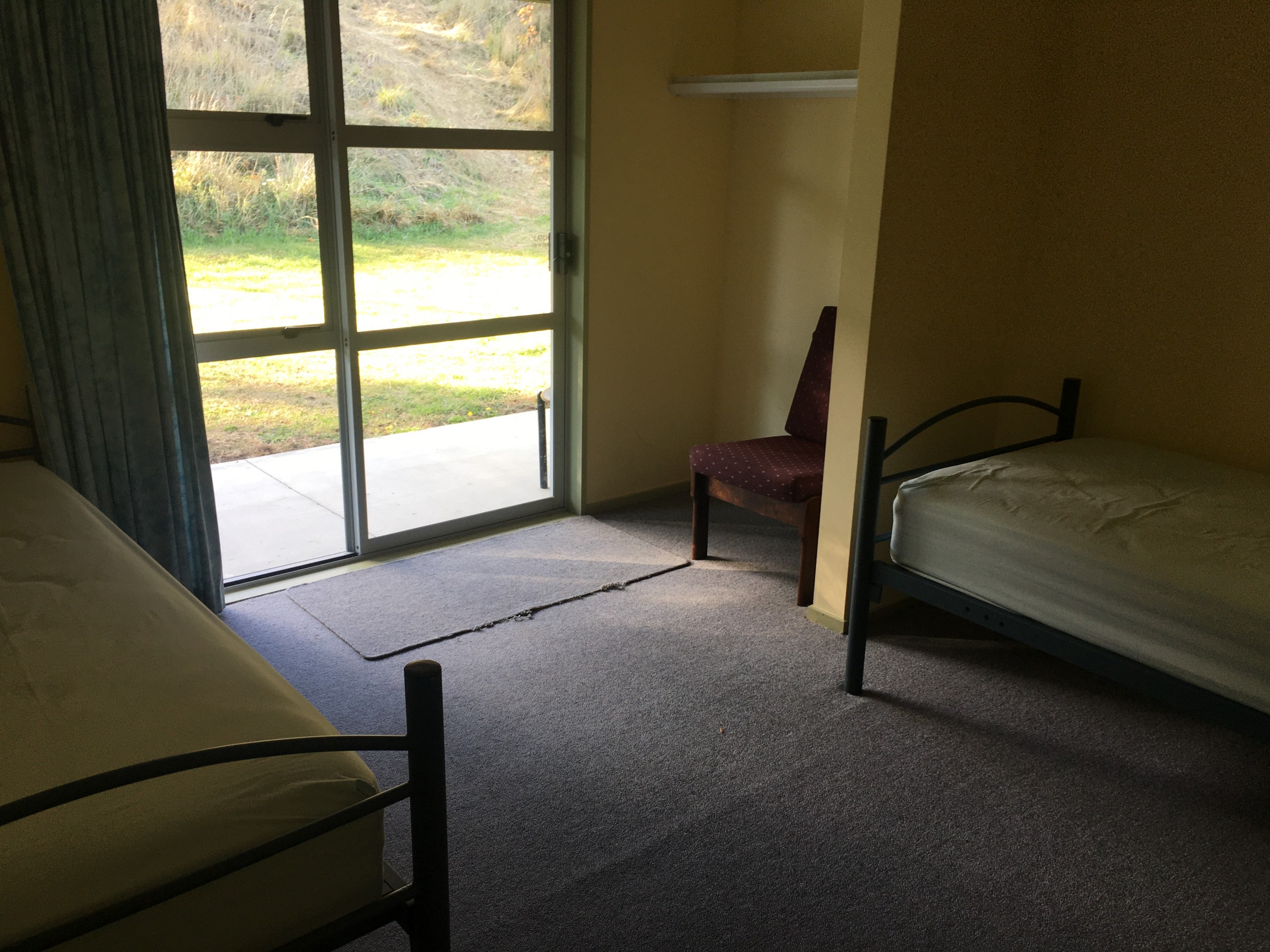 Bellbird Rooms 4 & 5 have two single beds and share a wet floor shower